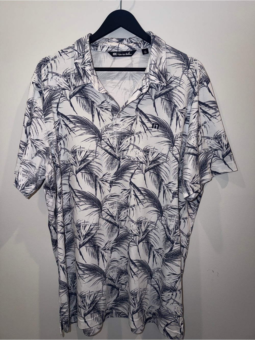 TravisMathew White Polo with Gray Tropical Palm Print